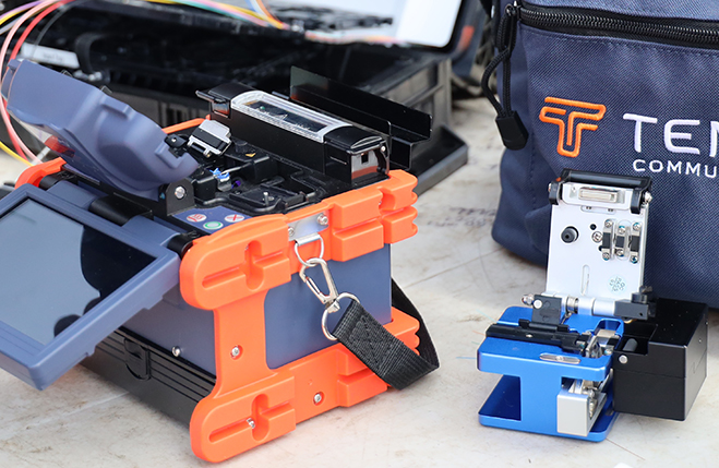 Fiber splicers and cleavers